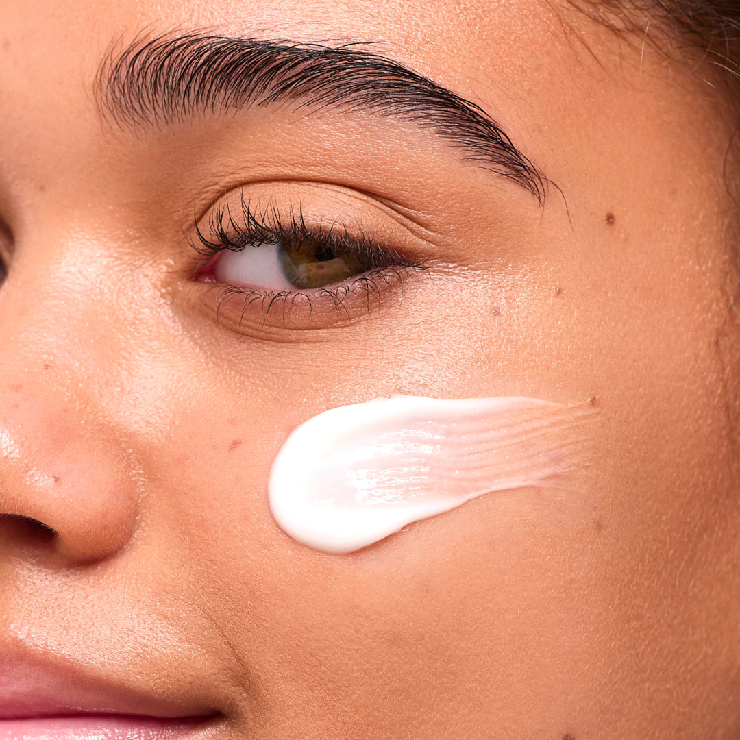 YES DAY founder Coco applying moisturizer to her changing teen skin.