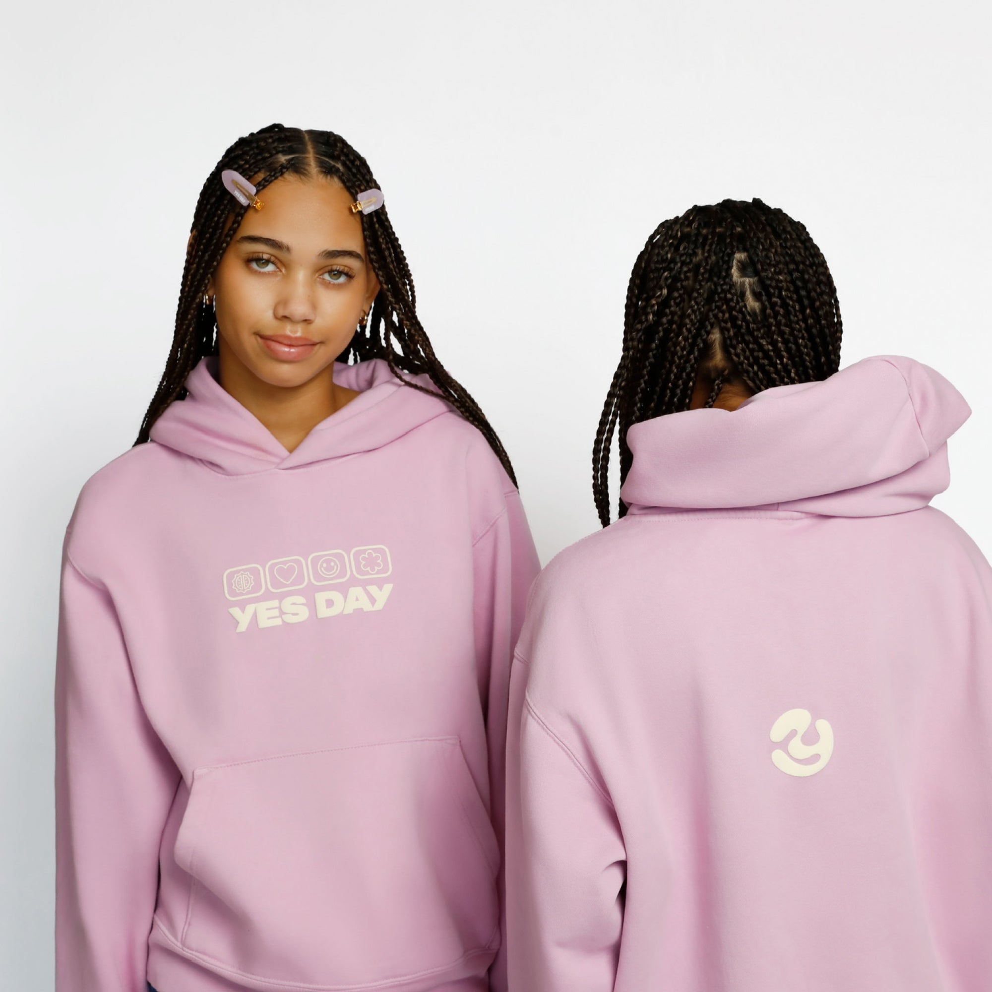 Front and back view of YES DAY Good Feels Hoodie Sweatshirts worn by YES DAY founder Coco and her sister.